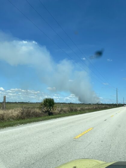 One of multiple sugar cane fires burning along the highway in March, 2022.